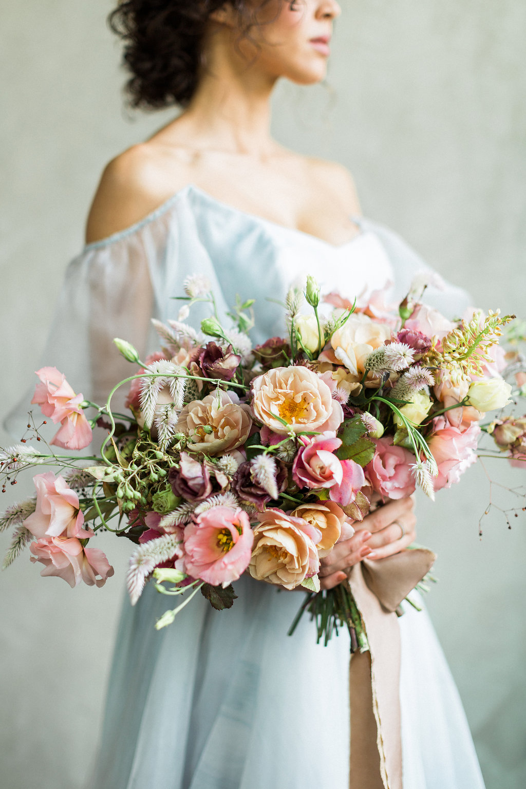 soft and romantic fine art wedding bouquets - https://ruffledblog.com/cloudy-day-wedding-inspiration-with-a-hand-painted-bridal-gown