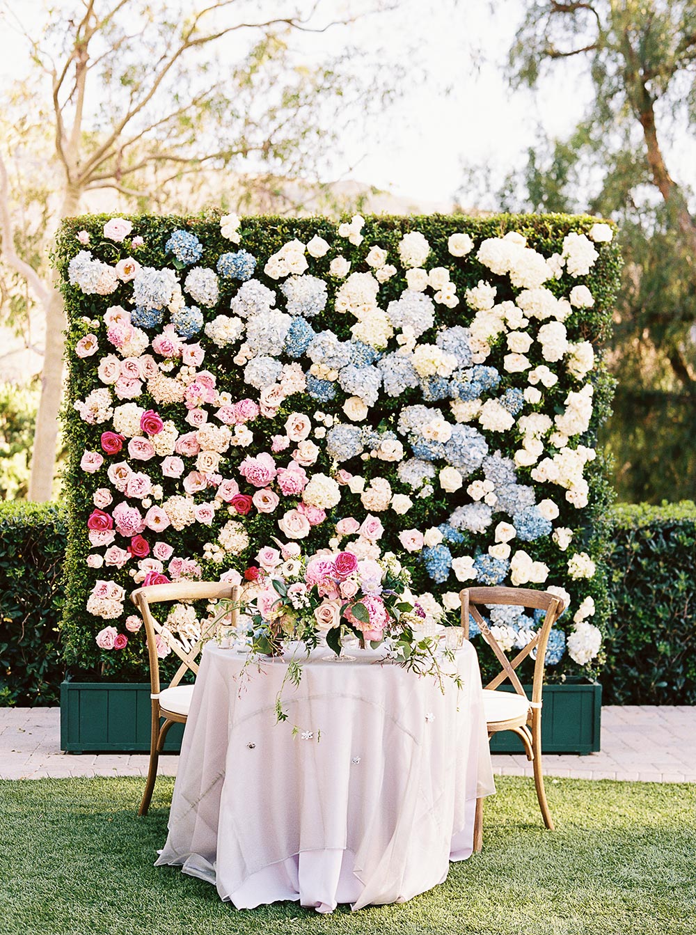 colorful flower wall wedding backdrop sweetheart table garden wedding