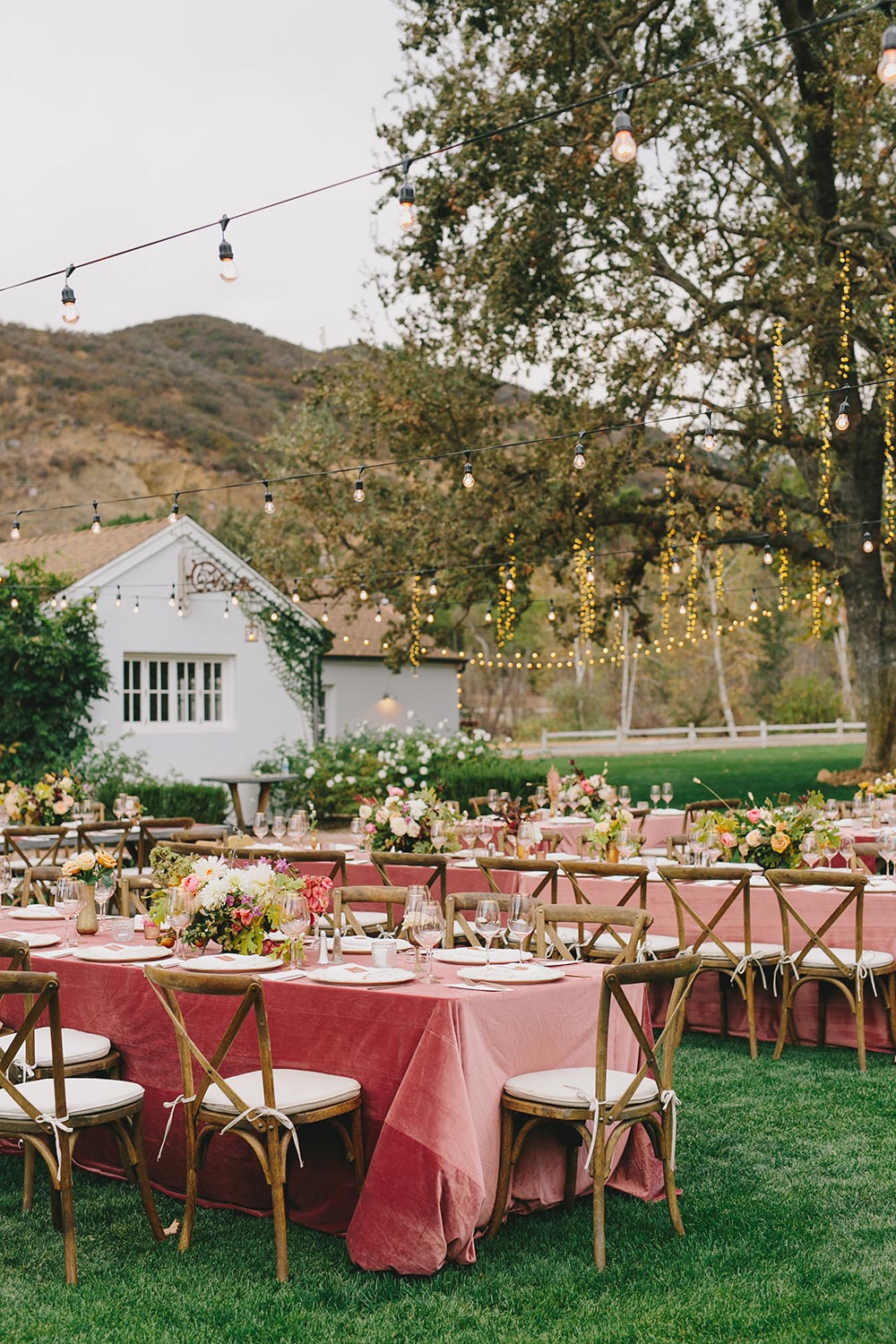 pink wedding tablescapes with market lights vineyard wedding