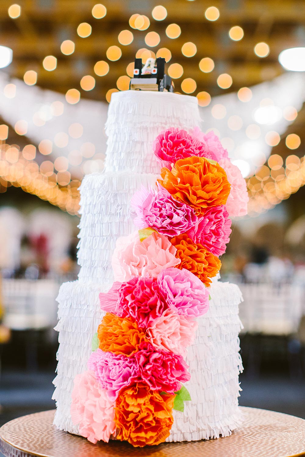 pink and orange carnations ruffled wedding cake